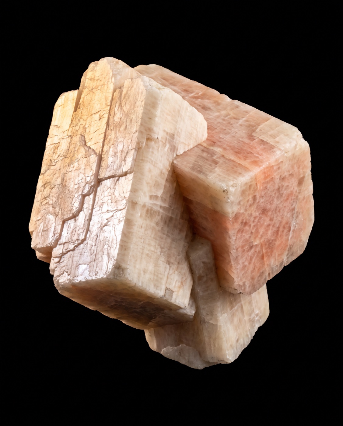 Raw feldspar crystals in cream and soft pink